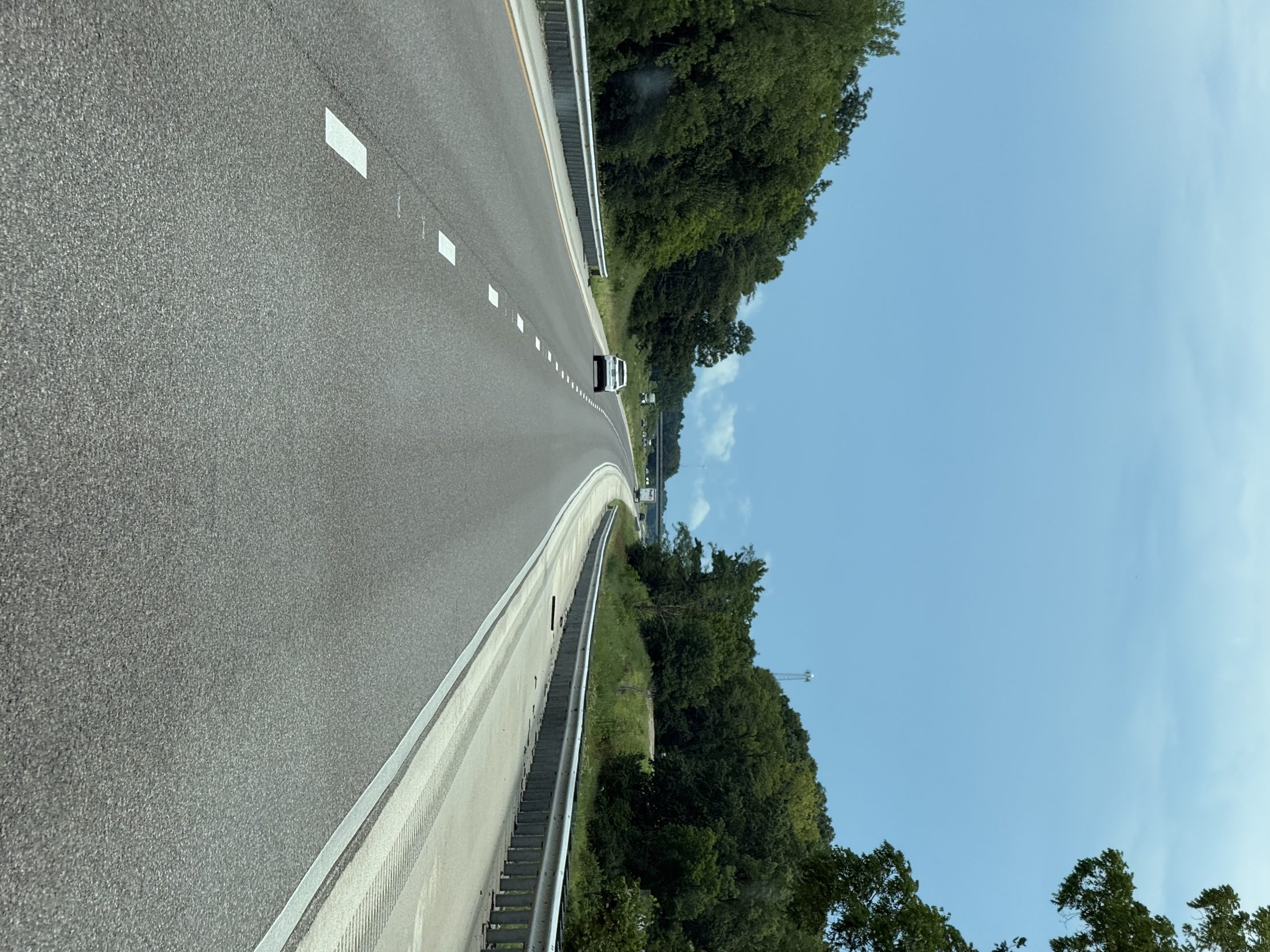 Green trees lining I-70 again